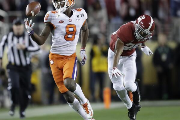 FILE - Clemson's Justyn Ross makes a one-handed catch in front of Alabama's Josh Jobe during the second half of the NCAA college football playoff championship game in Santa Clara, Calif., in this Monday, Jan. 7, 2019, file photo. Ross was selected to The Associated Press Preseason All-America first team offense, Monday Aug. 23, 2021. (AP Photo/Ben Margot, FIle)