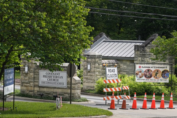 FILE - An entrance to The Covenant School is seen, May 24, 2023, in Nashville, Tenn. Seven Nashville police officers have been placed on “administrative assignment” amid an investigation into the unauthorized release of some writings by the shooter who killed six people, including three children, at the private elementary school in March, authorities said Wednesday, Nov. 8. (AP Photo/George Walker IV, File)