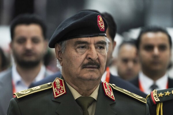 FILE - Libya's Khalifa Hifter, the commander of the self-styled Libyan National Army, is seen at the International Defense Exhibition and Conference in Abu Dhabi, United Arab Emirates, Monday, Feb. 20, 2023. A U.S. judge tossed out a series of civil lawsuits, Friday, April 12, 2024, against Hifter, who used to live in Virginia and was accused of killing innocent civilians in that country's civil war. (AP Photo/Jon Gambrell, File)