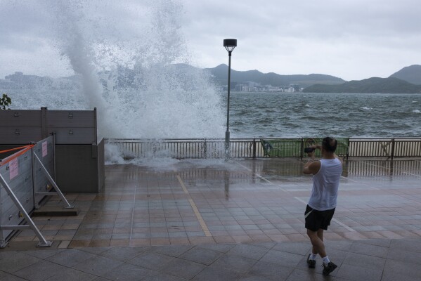 Hong Kong schools and stock market are closed as Typhoon Talim sweeps  toward China