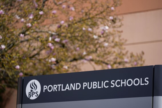 The Portland Public Schools district office is seen on Friday, April 5, 2024, in Portland, Ore. A young girl and her guardian have sued an Oregon nonprofit organization, Portland Public Schools and Multnomah County for $9 million, alleging they were negligent when male classmates sexually abused her at school and raped her during an after-school program when she was a nine-year-old third grader. (AP Photo/Jenny Kane)