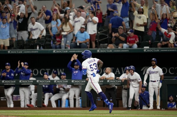 Scherzer dominates through seven innings as Rangers blank Angels 12-0