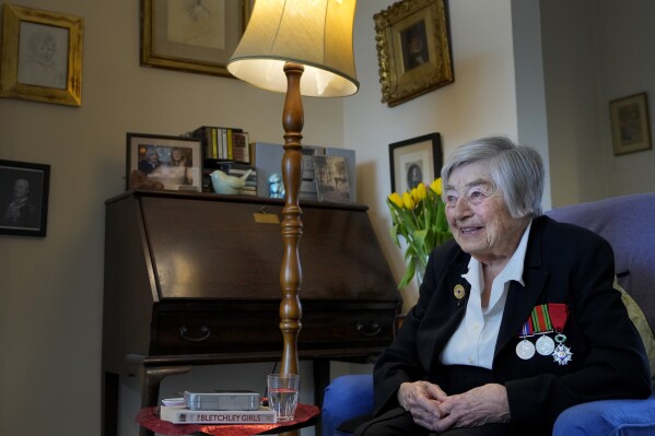 Patricia Owtram who was a serving Wren at the time of D-Day, at her home in London, Wednesday, April 10, 2024. D-Day, took place on June 6, 1944, the invasion of the beaches at Normandy in France by Alied forces during World War II. (AP Photo/Kirsty Wigglesworth)