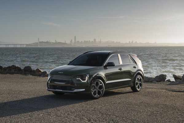 This photo provided by Kia shows the 2024 Niro. The Niro starts at $28,315 and gets up to an EPA-estimated 53 mpg in combined city/highway driving. (Courtesy of Kia America via AP)