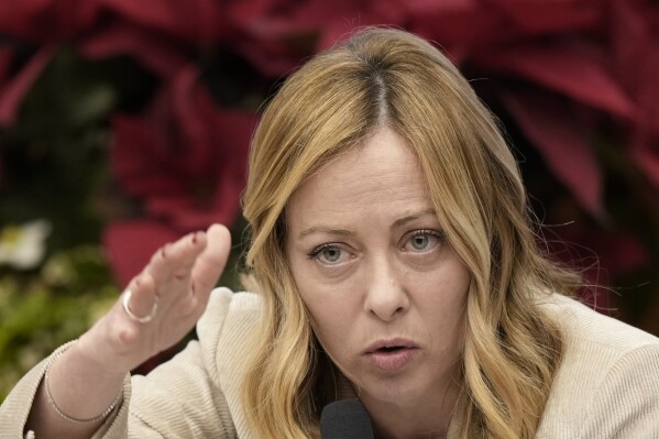 Italian Premier Giorgia Meloni answers journalists' questions during her year end press conference, in Rome, Thursday, Jan. 4, 2024. (AP Photo/Andrew Medichini)