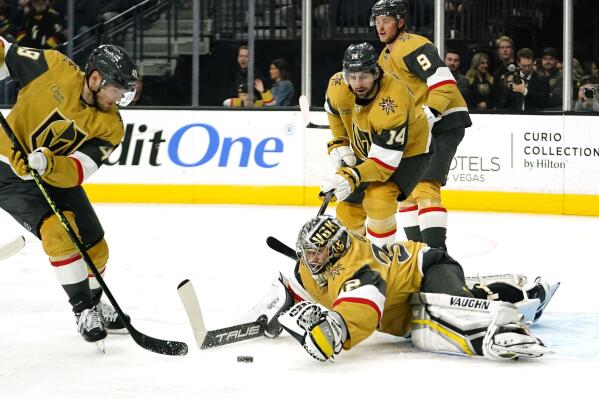 Vegas Golden Knights goaltender Jonathan Quick makes a save during the first period of an NHL hockey game against the Montreal Canadiens, Sunday, March 5, 2023, in Las Vegas. (AP Photo/Lucas Peltier)