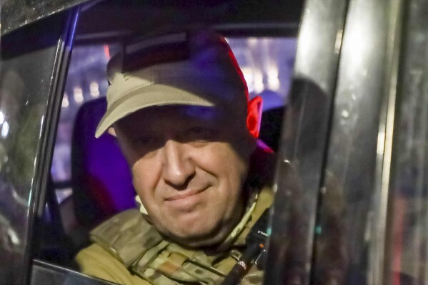 FILE - Yevgeny Prigozhin, head of the Wagner Group private military contractor, looks from a military vehicle leaving the headquarters of the Southern Military District in Rostov-on-Don, Russia, on June 24, 2023. (AP Photo/File)