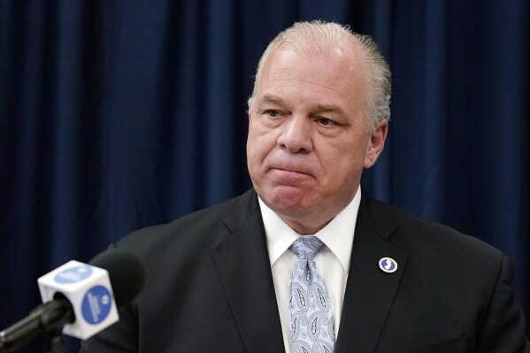 FILE — New Jersey Senate President Steve Sweeney speaks with members of the media during a news conference in Trenton, N.J., Nov. 10, 2021. The former top Democratic lawmaker on Monday, Dec. 11, 2023 announced a bid for governor of New Jersey, touting his credentials as a union ironworker and longtime legislator who worked to pass minimum wage indexed to inflation and a number of other measures. (AP Photo/Matt Rourke, File )