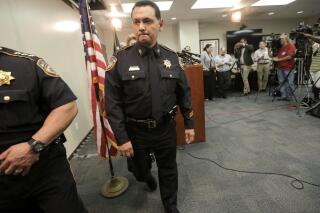 FILE - In this June 8, 2017, file photo, Harris County Sheriff Ed Gonzalez leaves a news conference, in Houston. President Joe Biden has nominated Gonzalez, a sheriff of one of the nation's most populous counties, to lead the agency that deports people in the country illegally. Gonzalez is Biden's pick for director of U.S. Immigration and Customs Enforcement, an agency that has been without a Senate-confirmed leader since 2017. (Elizabeth Conley/Houston Chronicle via AP, File)