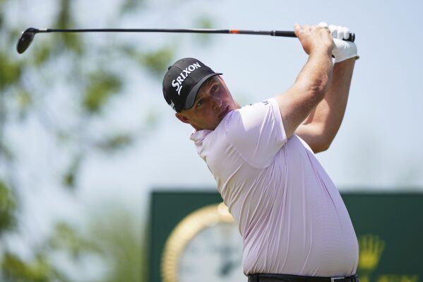 Sepp Straka, of Austria, watches his shot on the first hole during the final round of the Truist Championship golf tournament at the Philadelphia Cricket Club, Sunday, May 11, 2025, in Flourtown. (AP Photo/Matt Rourke)