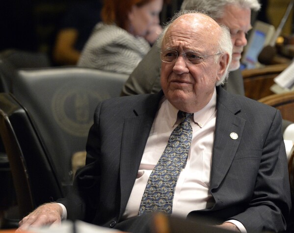 FILE - Kentucky Sen. Julian Carroll listens as fellow members of the Senate speak about a bill at the state Capitol, March, 24, 2015, in Frankfort, Ky. Former Kentucky Gov. Carroll, who led efforts to improve public schools and modernize the state’s judicial system — and who later rekindled his political career as a state legislator — died Sunday, Dec. 10, 2023, his family said. He was 92. (AP Photo/Timothy D. Easley, File)