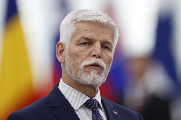 FILE - Czech Republic's President Petr Pavel delivers a speech at the European Parliament, Wednesday, Oct. 4, 2023 in Strasbourg, eastern France. Czech President Petr Pavel said he decided to sign into law a package of dozens dozens measures proposed by the government and approved by Parliament designed to keep the ballooning budget deficit under control. (AP Photo/Jean-Francois Badias, File)