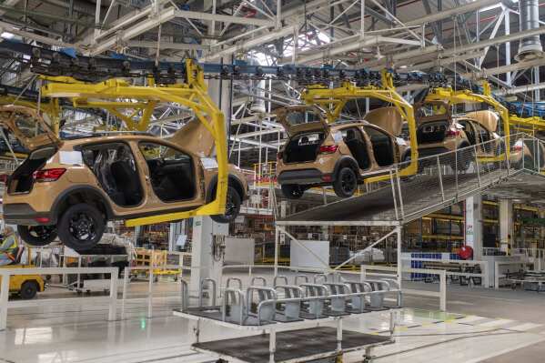 Cars are placed on a production line inside a Renault factory outside of Tangier, Morocco, Monday, April 29, 2024. Morocco has grown its automotive industry from virtually non-existent to Africa’s largest in less than two decades. The North African kingdom supplies more cars to Europe than China, India or Japan, and has the capacity to produce 700,000 vehicles a year. (AP Photo)