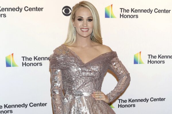 FILE - Carrie Underwood attends the 42nd Annual Kennedy Center Honors in Washington on Dec. 8, 2019. Underwood released her first album of gospel music called “My Savior,” on Friday, March 26. (Photo by Greg Allen/Invision/AP, File)