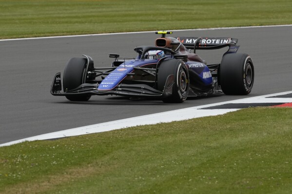 FILE - Williams driver Franco Colapinto of Argentina steers his car at the Silverstone racetrack in Silverstone, England, July 5, 2024. (AP Photo/Luca Bruno, File)