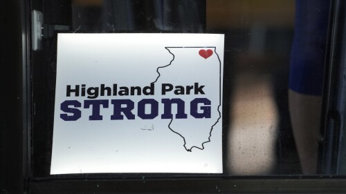 A Highland Park Strong sign is displayed at a restaurant in Highland Park, Ill., Monday, July 3, 2023. One year after a shooter terrorized July Fourth parade-goers in Highland Park, Illinois, community members are planning to gather to honor the seven people who were killed, commemorate the day and reclaim the space to move forward. (AP Photo/Nam Y. Huh)