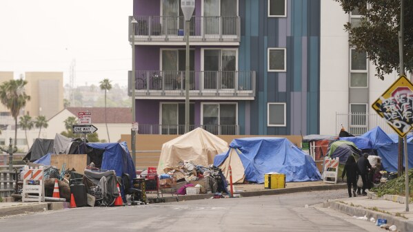 Newsom pushes California cities to ban homeless encampments