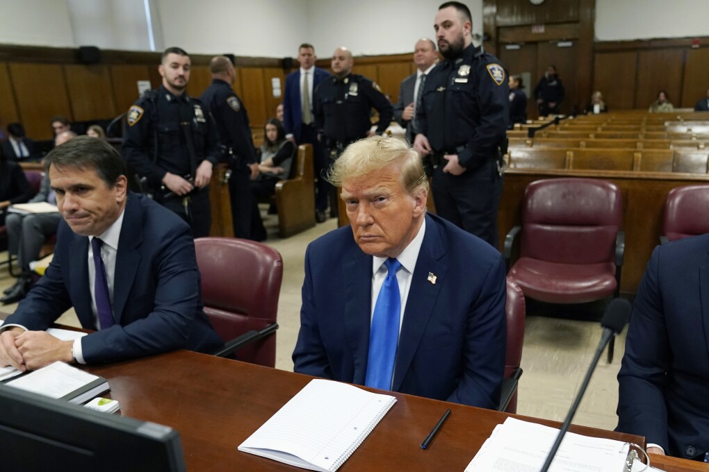 Former President Donald Trump awaits the start of proceedings during jury selection at Manhattan criminal court, Thursday, April 18, 2024 in New York.   (Timothy A. Clary/Pool Photo via AP)
