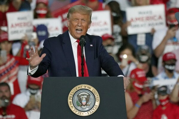 President Donald Trump speaks at campaign rally at the Orlando Sanford International Airport Monday, Oct. 12, 2020, in Sanford, Fla. (AP Photo/John Raoux)