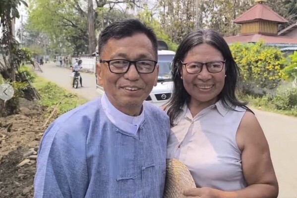 Hkalam Samson poses for photography together with his wife after his release from the prison in Myintkyina township in Kachin state, Myanmar on Wednesday, April 17, 2024. Hkalam Samson, prominent Christian church leader and human rights advocate from Myanmar’s Kachin ethnic minority, was detained by the authorities just hours after he was released from prison under an amnesty by the military government, a relative, a colleague and local media said Thursday, April 18, 2024.(AP Photo)