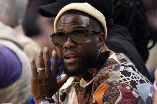 Comedian Kevin Hart is seen during the first half of an NBA basketball game between the Los Angeles Lakers and the Phoenix Suns Thursday, Oct. 26, 2023, in Los Angeles. (AP Photo/Mark J. Terrill)