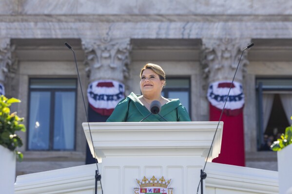 Jenniffer Gonzalez speaks after she was sworn in as governor outside the Capitol in San Juan, Puerto Rico, Jan. 2, 2025. (AP Photo/Alejandro Granadillo, File)