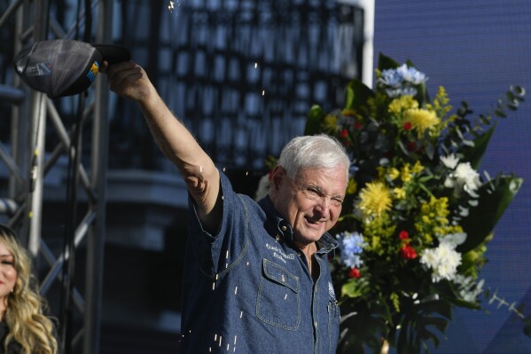 Panama's former President Ricardo Martinelli waves to supporters during a campaign rally, in Panama City, Feb. 3, 2024. (AP Photo/Agustin Herrera, File)