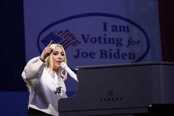FILE - In this Nov. 2, 2020 file photo, Lady Gaga performs during a drive-in rally for then Democratic presidential candidate former Vice President Joe Biden at Heinz Field in Pittsburgh.  Lady Gaga will sign the national anthem at Joe Biden's presidential inauguration on the West Front of the U.S. Capitol when Biden is sworn in as the nation's 46th president next Wednesday. (AP Photo/Andrew Harnik)
