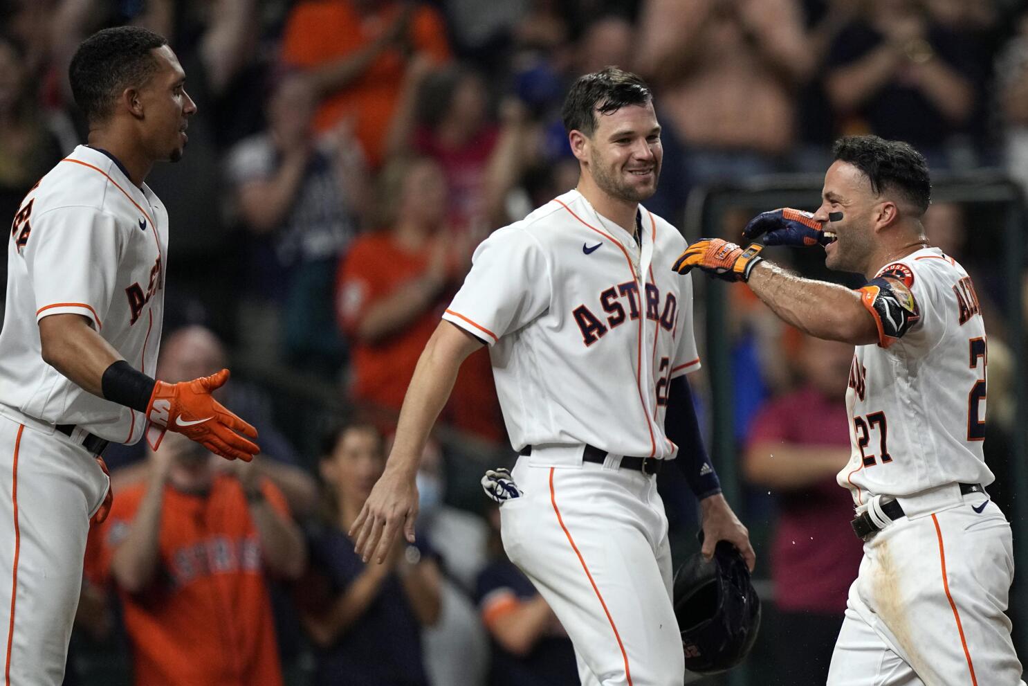 Altuve hits grand slam in 10th, Astros rally past Rangers