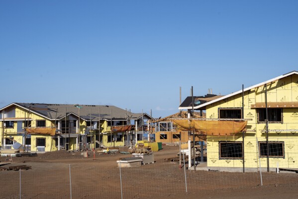 FILE - Kaiaulu o Kukuia, a 200-unit affordable housing complex under construction that was not seriously affected by August's wildfire, is pictured on Oct. 3, 2023, in Lahaina, Hawaii. Gov. Josh Green on Tuesday, May 28, 2024, signed legislation meant to jumpstart the construction of more dwellings to address an acute housing shortage that is pushing local-born residents to move to states where the cost of living is less. (AP Photo/Mengshin Lin, File)
