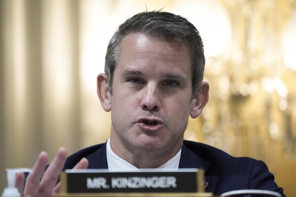 FILE - Rep. Adam Kinzinger, R-Ill., speaks as the House select committee investigating the Jan. 6 attack on the U.S. Capitol Hill in Washington on Dec. 19, 2022. The Open Field, a Penguin Random House imprint overseen by Maria Shriver, announced Tuesday that Kinzinger’s “Renegade: My Life in Faith, the Military, and Defending America from Trump’s Attack on Democracy” is scheduled for on release Oct. 17. (AP Photo/Jacquelyn Martin, File)