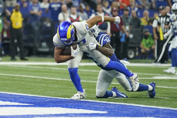 Stafford overcomes injury to throw winning TD pass to Nacua in OT to give  Rams 29-23 win over Colts