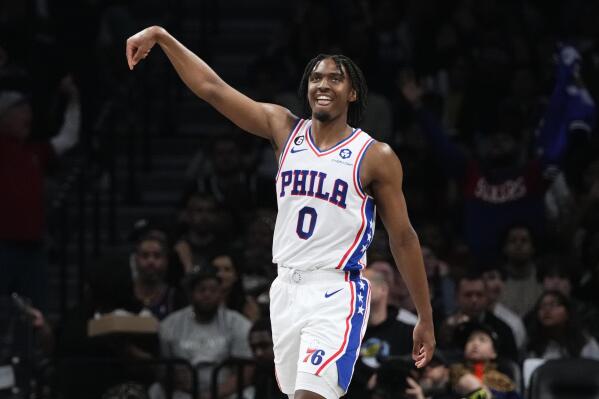 Philadelphia 76ers' Tyrese Maxey (0) gestures after making a 3-point shot during the second half of Game 4 in an NBA basketball first-round playoff series against the Brooklyn Nets, Saturday, April 22, 2023, in New York. (AP Photo/Frank Franklin II)