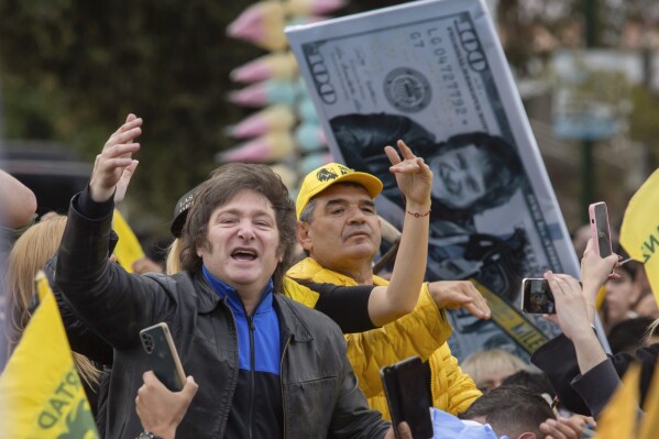 Presidential hopeful of the Liberty Advances coalition Javier Milei waves to supporters during a campaign rally in Salta, Argentina, Thursday, Oct. 12, 2023. Elections are set for Oct. 22. (AP Photo/Javier Corbalan)