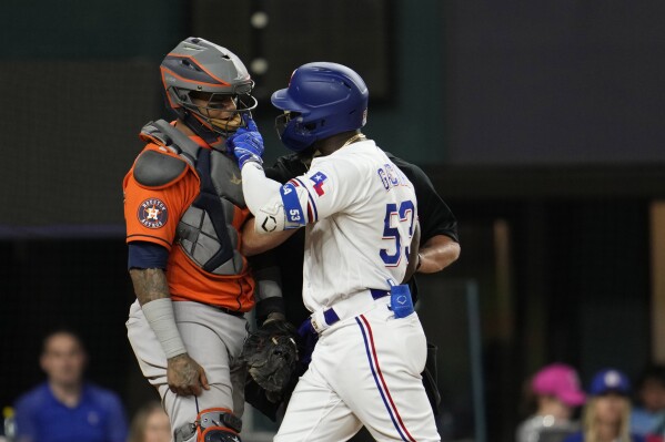 Oakland, USA. 26th May, 2022. Texas Rangers second baseman Marcus Semien  (2) swings at a pitch during the second inning against the Oakland  Athletics in Oakland, CA Thursday May 26, 2022. (Image