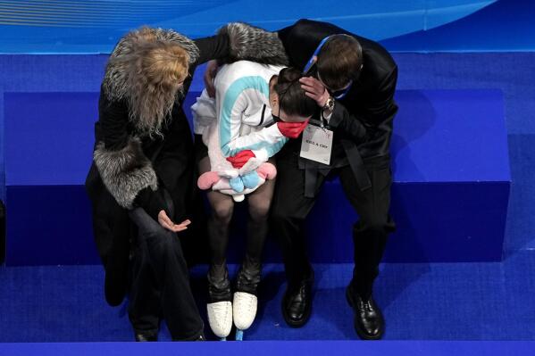 Kamila Valieva, of the Russian Olympic Committee, reacts after competing in the women's free skate program during the figure skating competition at the 2022 Winter Olympics, Thursday, Feb. 17, 2022, in Beijing. (AP Photo/Jeff Roberson)