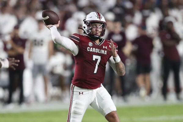South Carolina quarterback Spencer Rattler (7) throws a pass during the first half of an NCAA college football game against Mississippi State on Saturday, Sept. 23, 2023, in Columbia, S.C. (AP Photo/Artie Walker Jr.)