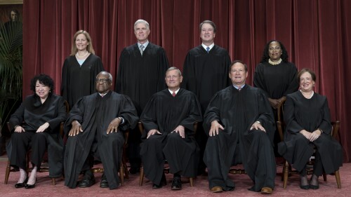 FILE - Members of the Supreme Court sit for a new group portrait following the addition of Associate Justice Ketanji Brown Jackson, at the Supreme Court building in Washington, Oct. 7, 2022. Bottom row, from left, Justice Sonia Sotomayor, Justice Clarence Thomas, Chief Justice John Roberts, Justice Samuel Alito, and Justice Elena Kagan. Top row, from left, Justice Amy Coney Barrett, Justice Neil Gorsuch, Justice Brett Kavanaugh, and Justice Ketanji Brown Jackson. Records obtained by The Associated Press show that Supreme Court justices have attended publicly funded events at colleges and universities that allowed the schools to put the justices in the room with influential donors, including some whose industries have had interests before the court. (AP Photo/J. Scott Applewhite, File)