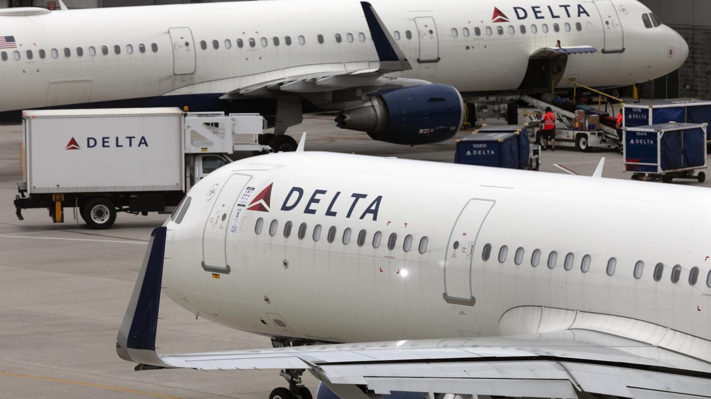 Delta says it's reviewing how man boarded wrong flight. A family says he was following them thumbnail