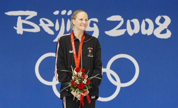 Who is Kirsty Coventry, the next president of the International Olympic  Committee? | AP News