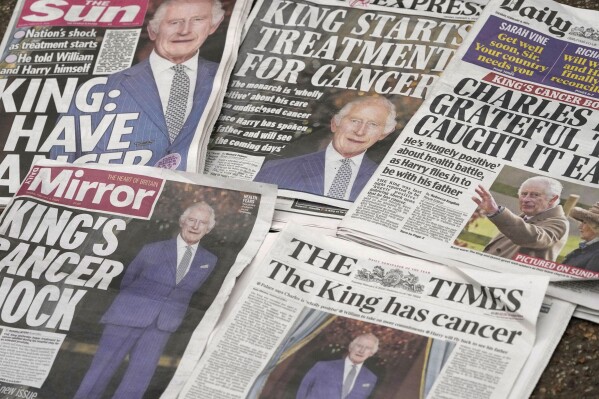 FILE - A selection of front pages of the British national newspapers for Feb. 6, 2024, after it was announced that King Charles III has cancer. Buckingham Palace says King Charles III will resume his public duties next week following treatment for cancer. The announcement on Friday April 26, 2024, comes almost three months after Charles took a break from public appearances to focus on his treatment for an undisclosed type of cancer. (AP Photo/Kin Cheung, File)