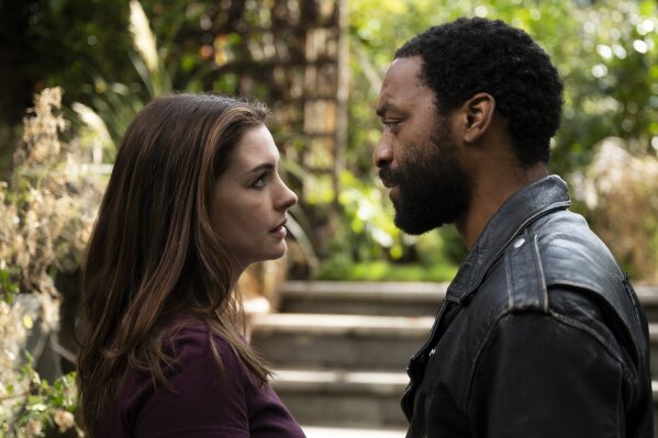 This image released by HBO Max shows Anne Hathaway and Chiwetel Ejiofor in a scene from "Lockdown." (Susie Allnutt/HBO Max via AP)