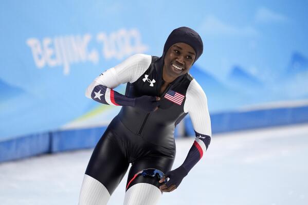 Erin Jackson of the United States reacts after her heat in the speedskating women's 500-meter race at the 2022 Winter Olympics, Sunday, Feb. 13, 2022, in Beijing. (AP Photo/Sue Ogrocki)