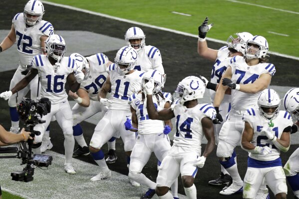 Hilton, Taylor lead Colts' 44-27 rout of fading Raiders