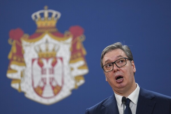 Serbian President Aleksandar Vucic speaks during a press conference after talks with his Cuban counterpart Miguel Diaz-Canel at the Serbia Palace in Belgrade, Serbia, Wednesday, June 21, 2023. Diaz-Canel is on a two-day official visit to Serbia. (AP Photo/Darko Vojinovic)