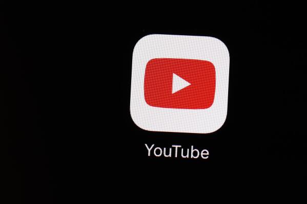 FILE - The YouTube app is displayed on an iPad on March 20, 2018, in Baltimore. YouTube will stop removing content that falsely claims the 2020 election or other past U.S. presidential elections were marred by “widespread fraud, errors or glitches," the platform announced Friday, June 2, 2023. (AP Photo/Patrick Semansky, File)