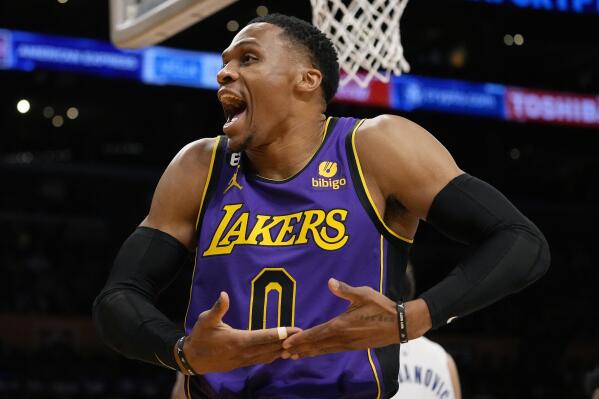 Los Angeles Lakers guard Russell Westbrook celebrates after scoring during the first half of an NBA basketball game against the Detroit Pistons Friday, Nov. 18, 2022, in Los Angeles. (AP Photo/Mark J. Terrill)