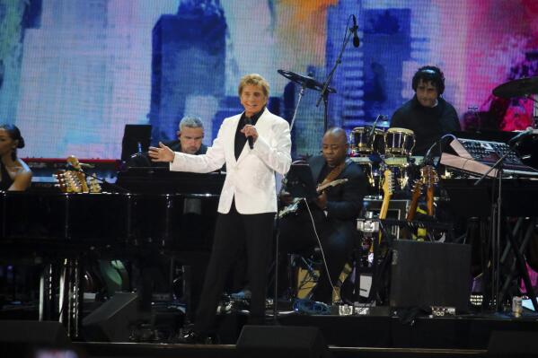 Barry Manilow performs at We Love NYC: The Homecoming Concert at The Great Lawn in Central Park on Saturday, Aug. 21, 2021, in New York. (Photo by Andy Kropa/Invision/AP)