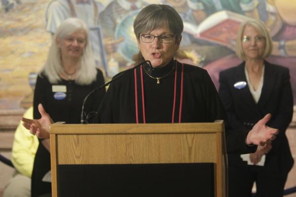 Kansas Gov. Laura Kelly speaks during an event at the Kansas Statehouse, Tuesday, April 25, 2023, in Topeka, Kansas. The Democratic governor vetoed a bill that would allow providers to be prosecuted criminally over allegations about their care of newborns delivered during certain abortion procedures but the Republican-controlled Legislature overrode her action. (AP Photo/John Hanna)