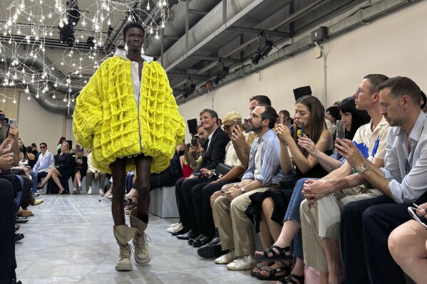 A model wears a creation from the JW Anderson Spring/Summer 2025 collection, shown in Milan, Italy, Sunday, June 16, 2024. (AP Photo/Colleen Barry).